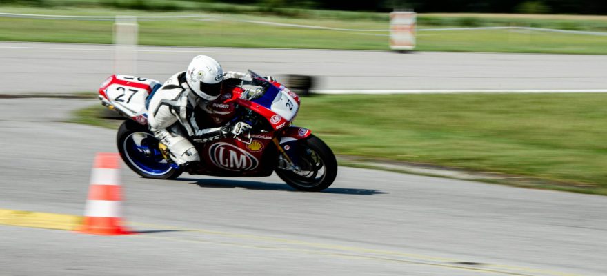 A person riding a motorcycle on a race track