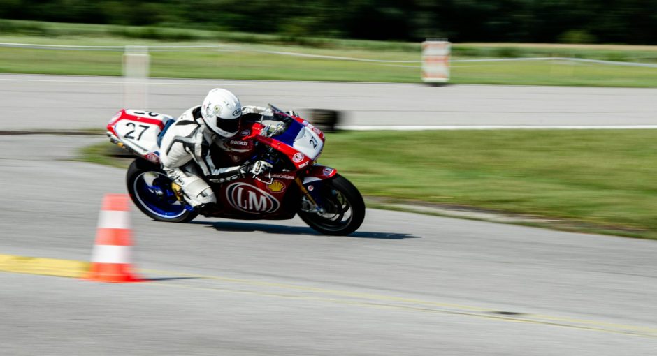 A person riding a motorcycle on a race track